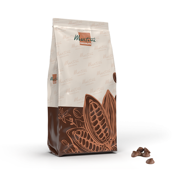 Bag of Martini Cioccolato chocolate chips with cocoa pod illustrations, with loose chocolate chips beside it.